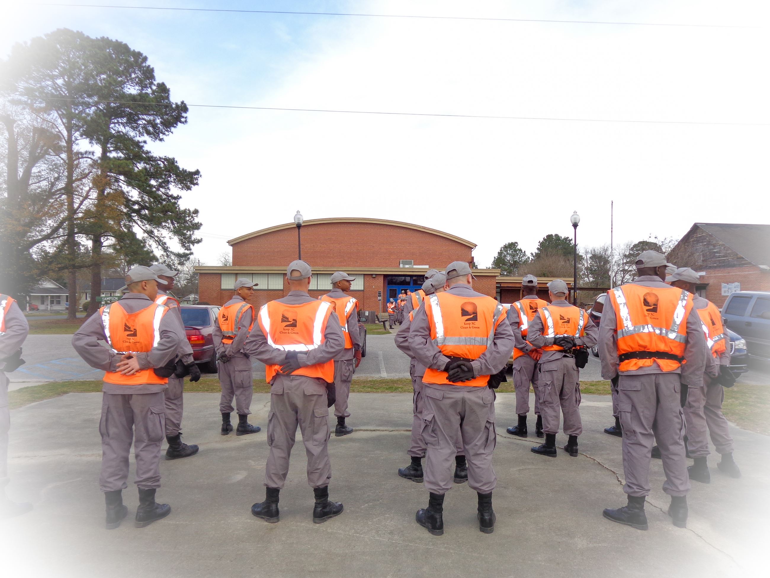 Clean Up Crew in Orange Vests