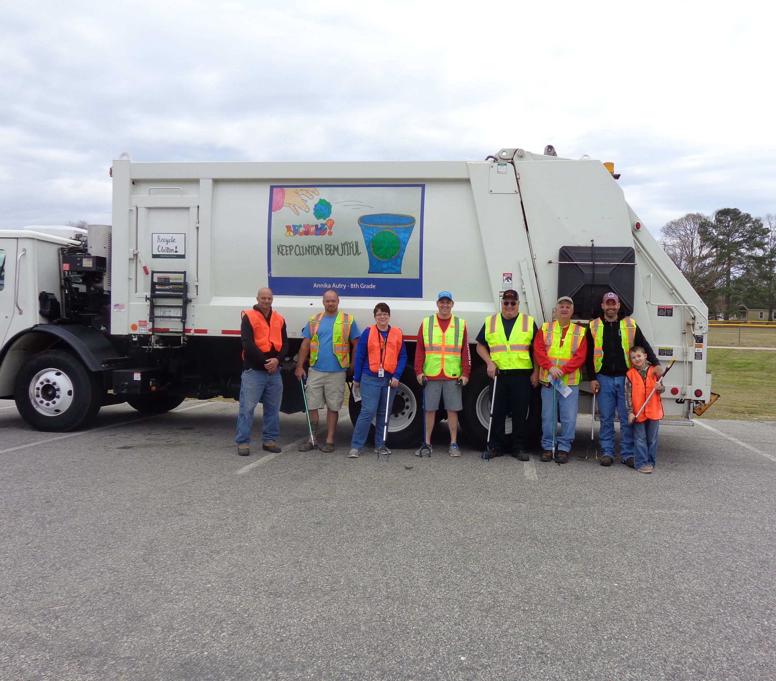 People in Front of Truck